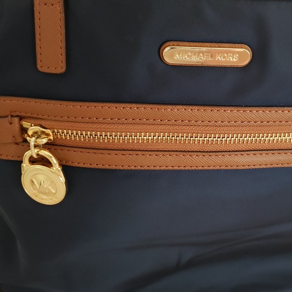 SOLD. Michael Kors "kempton" Navy blue nylon purse. Preowned.